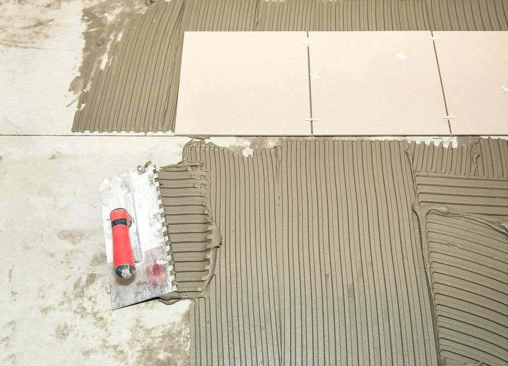 jn江南体育 瓷砖胶一平方用多少？这些因素决定瓷砖胶用量